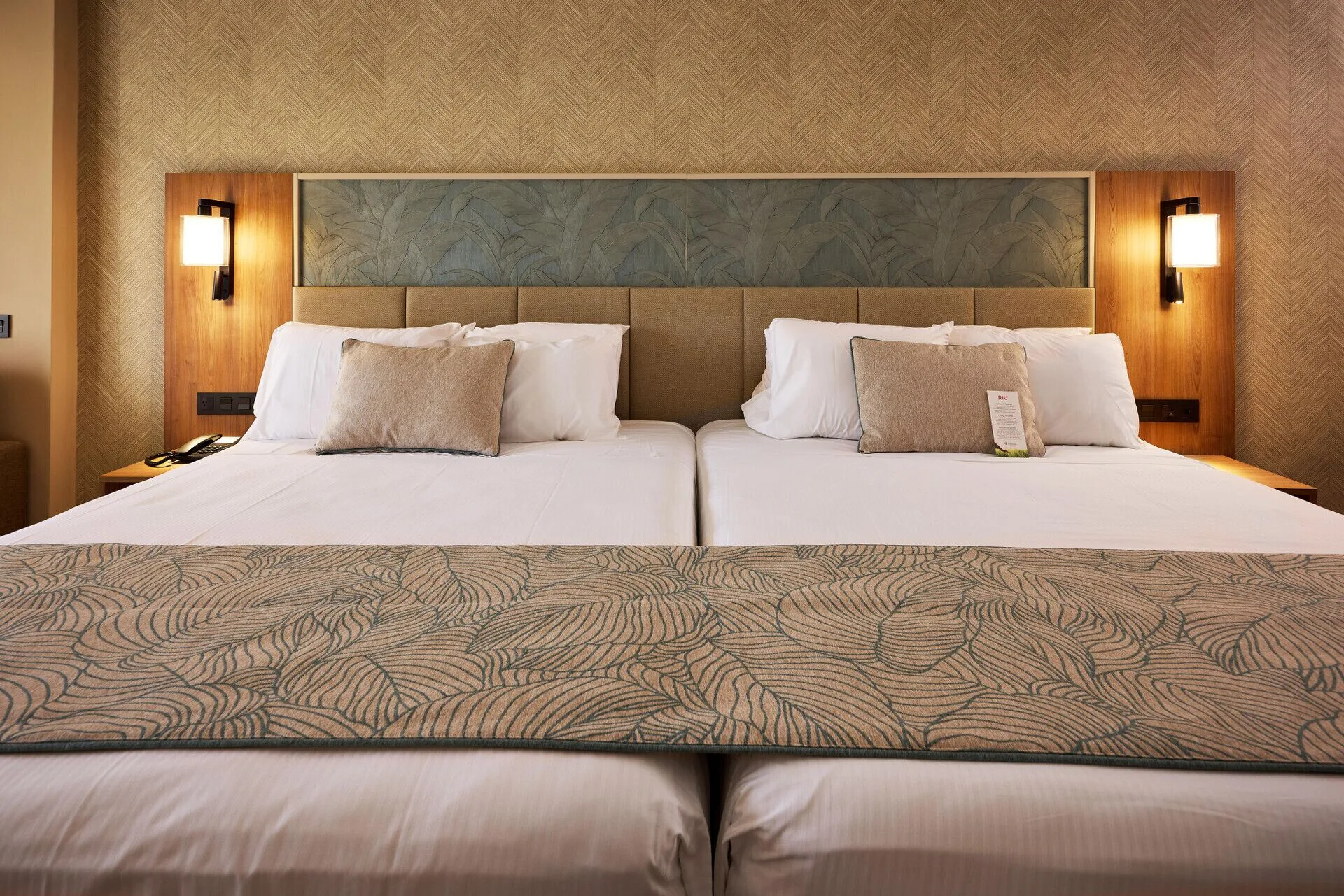 Junior Suite Garden View close-up of two beds at Hotel Riu Palace Bavaro.