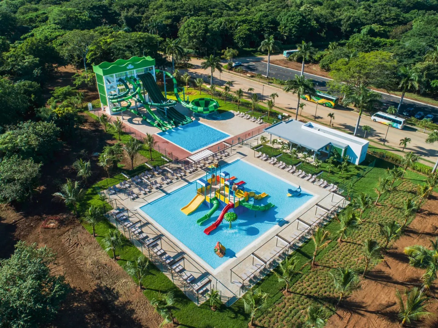 Aerial view of water park pools and slides at Hotel Riu Palace Costa Rica.
