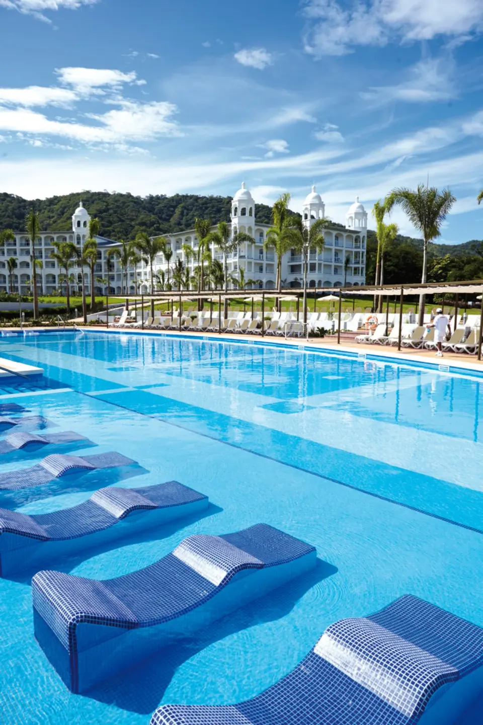 In-water loungers in the main pool at Hotel Riu Palace Costa Rica.