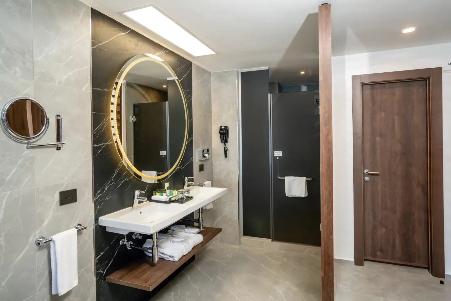 Vanity and shower area in a Junior Suite bathroom at Hotel Riu Palace Kukulkan.