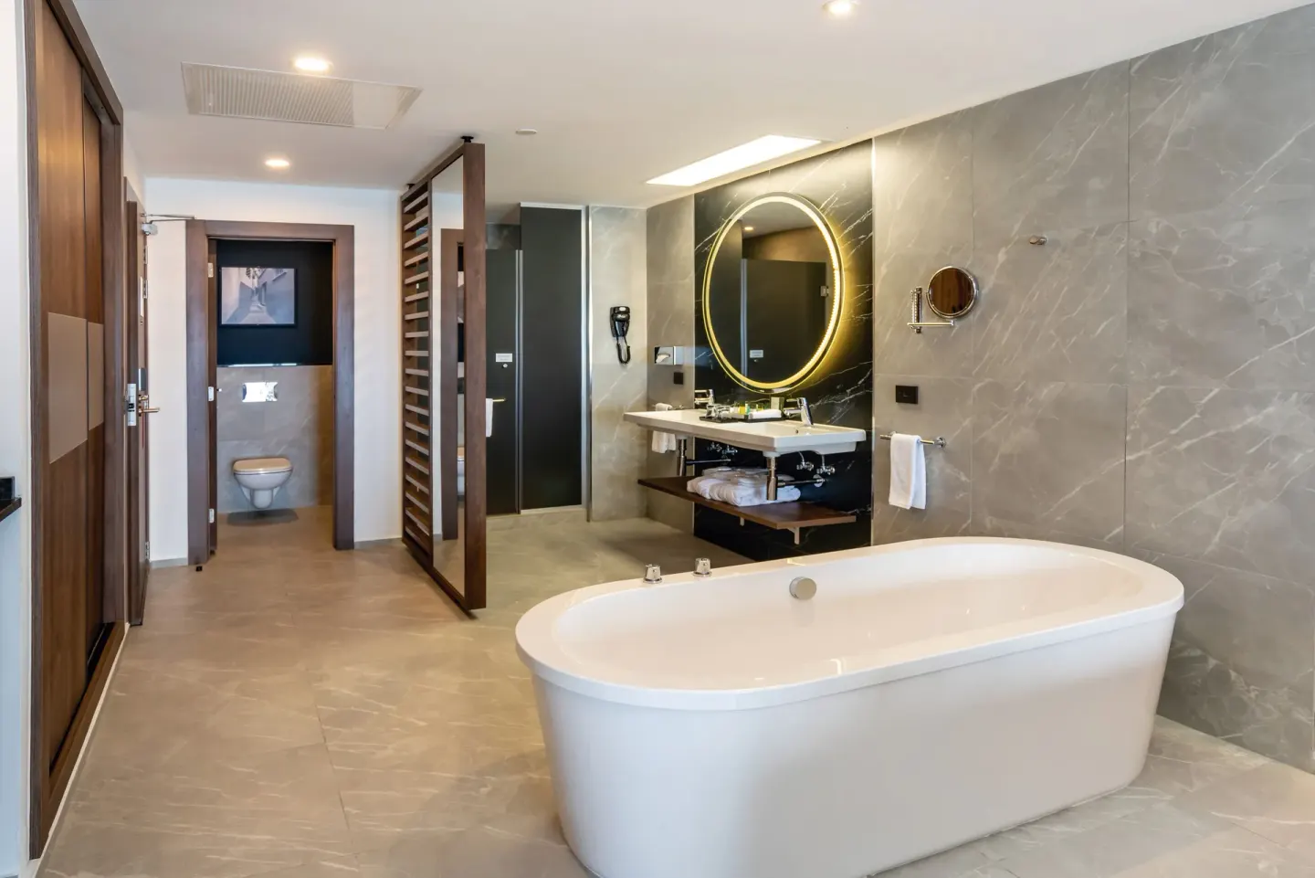 Junior Suite Ocean View Elite Club bathroom with freestanding tub at Hotel Riu Palace Kukulkan.