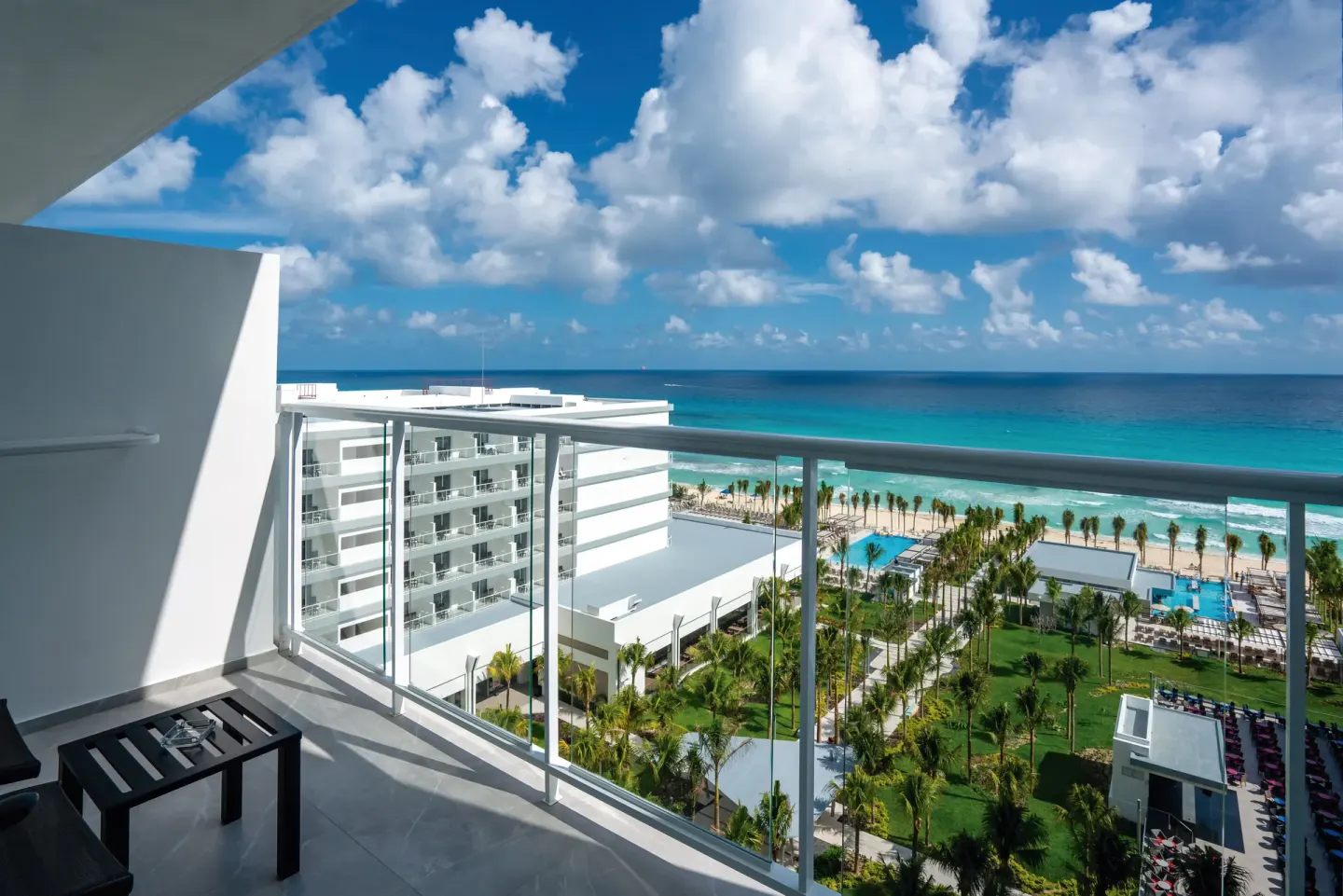 Junior Suite Ocean View balcony overlooking the sea at Hotel Riu Palace Kukulkan.