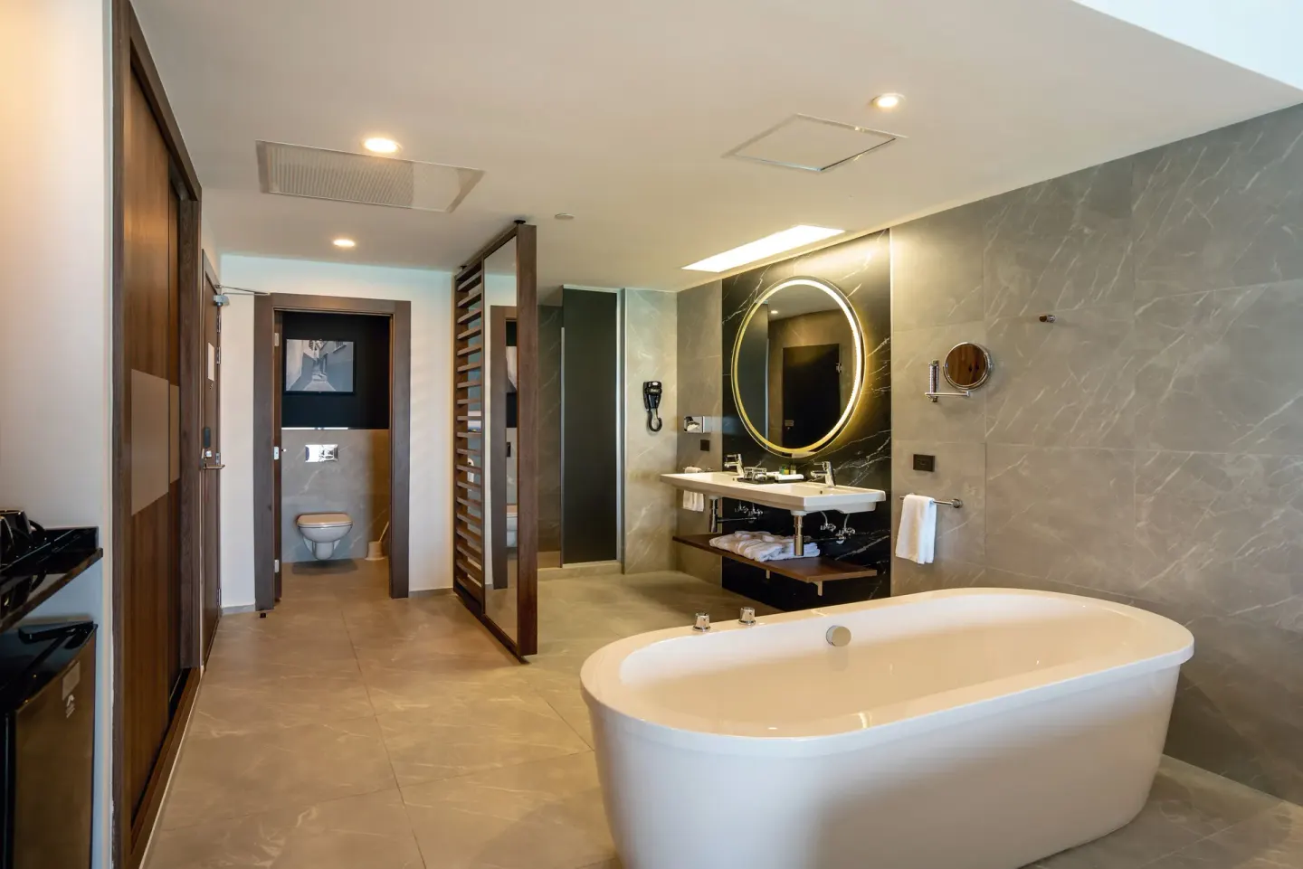 Junior Suite Ocean View bathroom with freestanding tub at Hotel Riu Palace Kukulkan.