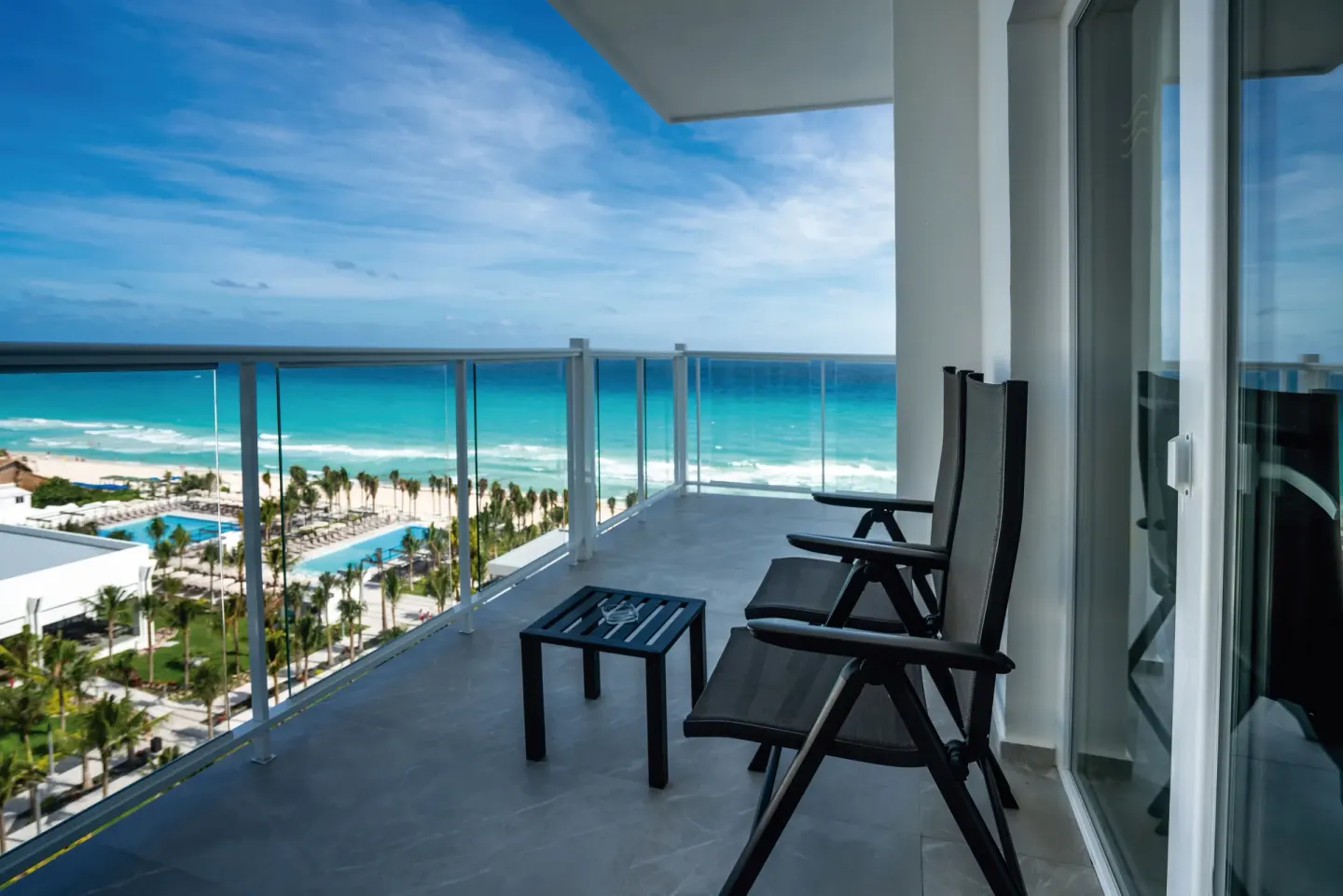 Junior Suite balcony with ocean view at Hotel Riu Palace Kukulkan.