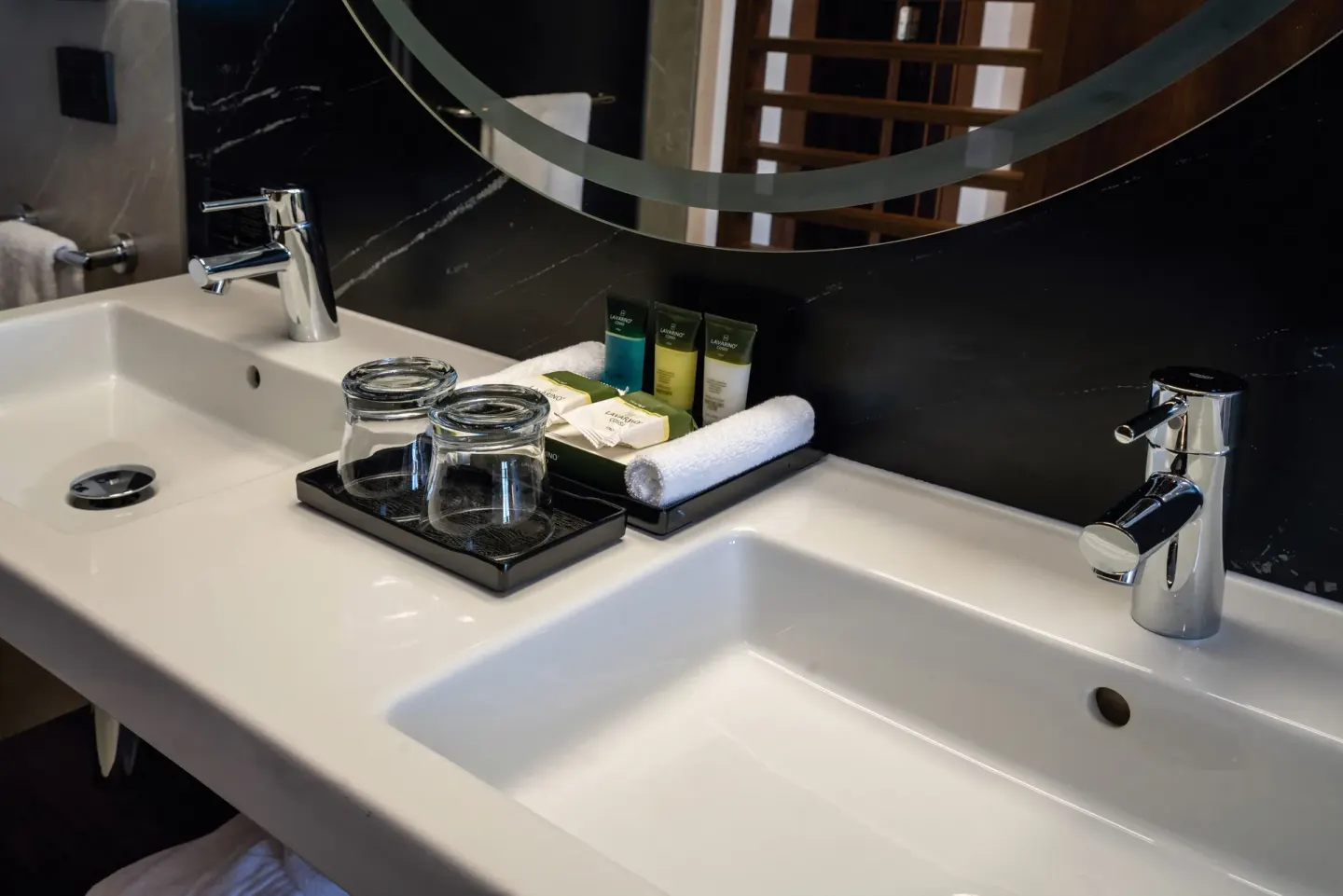 Junior Suite double vanity with bath amenities at Hotel Riu Palace Kukulkan.