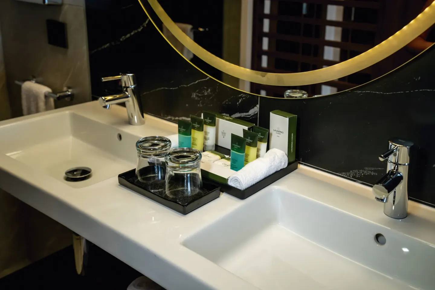 Suite Ocean View Elite Club bathroom vanity at Hotel Riu Palace Kukulkan with twin sinks and amenities.
