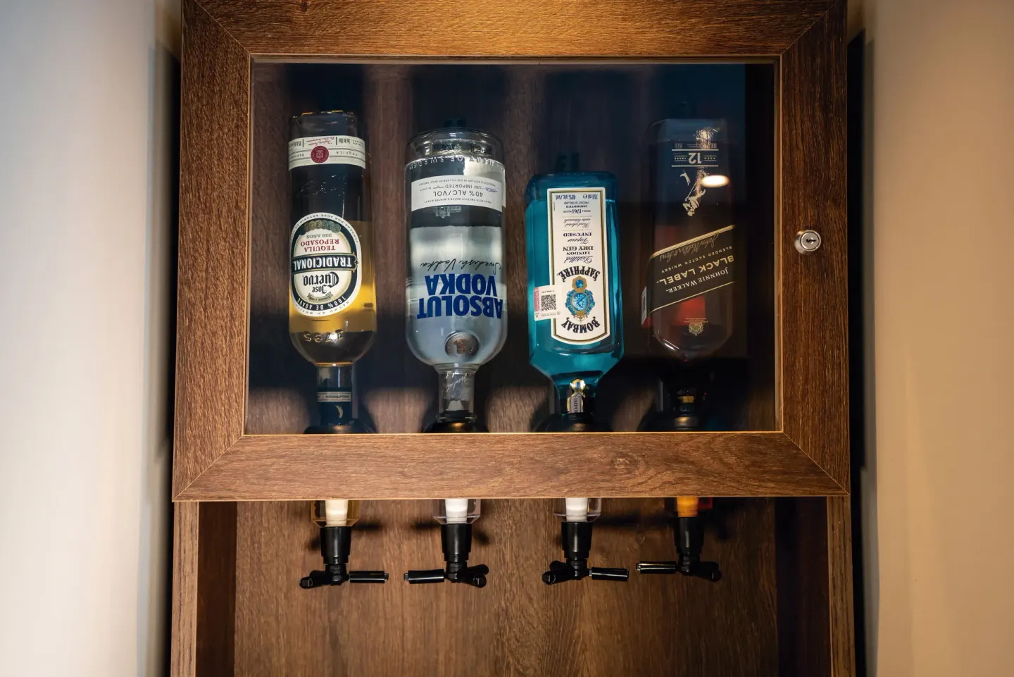 Suite Ocean View Elite Club in-room liquor dispenser at Hotel Riu Palace Kukulkan.