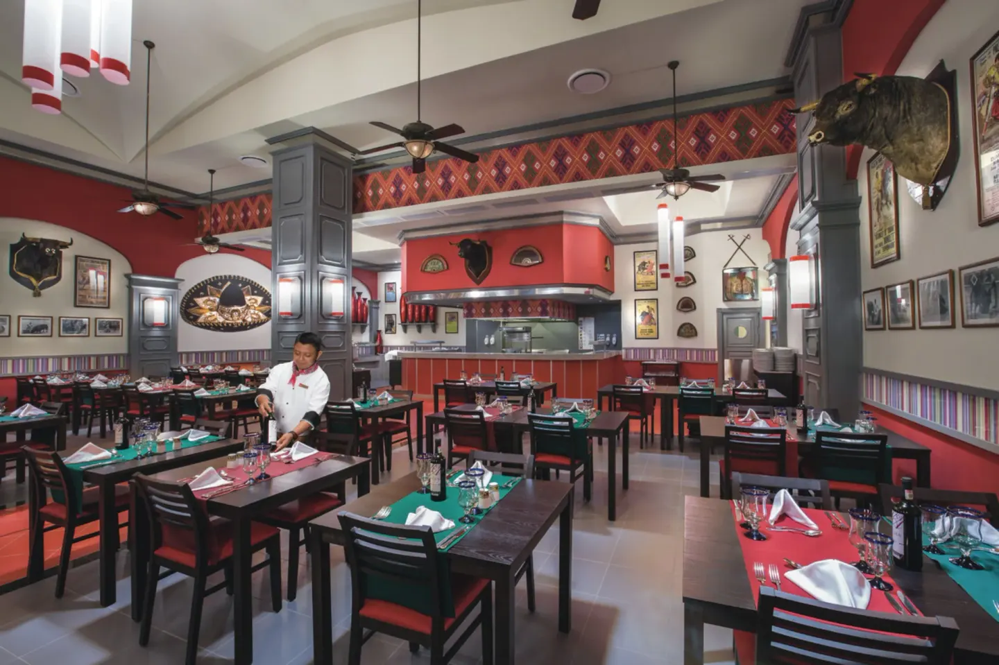 Mexican-themed dining room set for service at Hotel Riu Palace Las Americas.