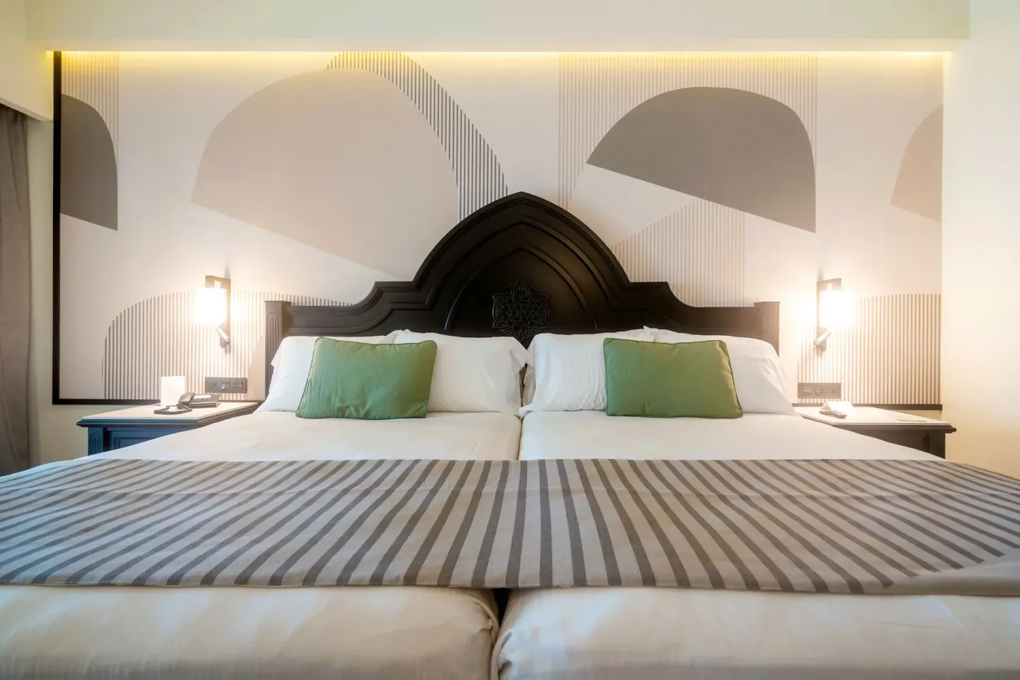 Two joined beds in a bedroom of the Junior Suite 2 Bedrooms at Hotel Riu Palace Pacifico.