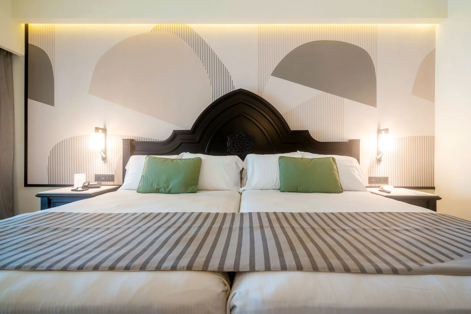 Two joined beds in a bedroom of the Junior Suite 2 Bedrooms at Hotel Riu Palace Pacifico.