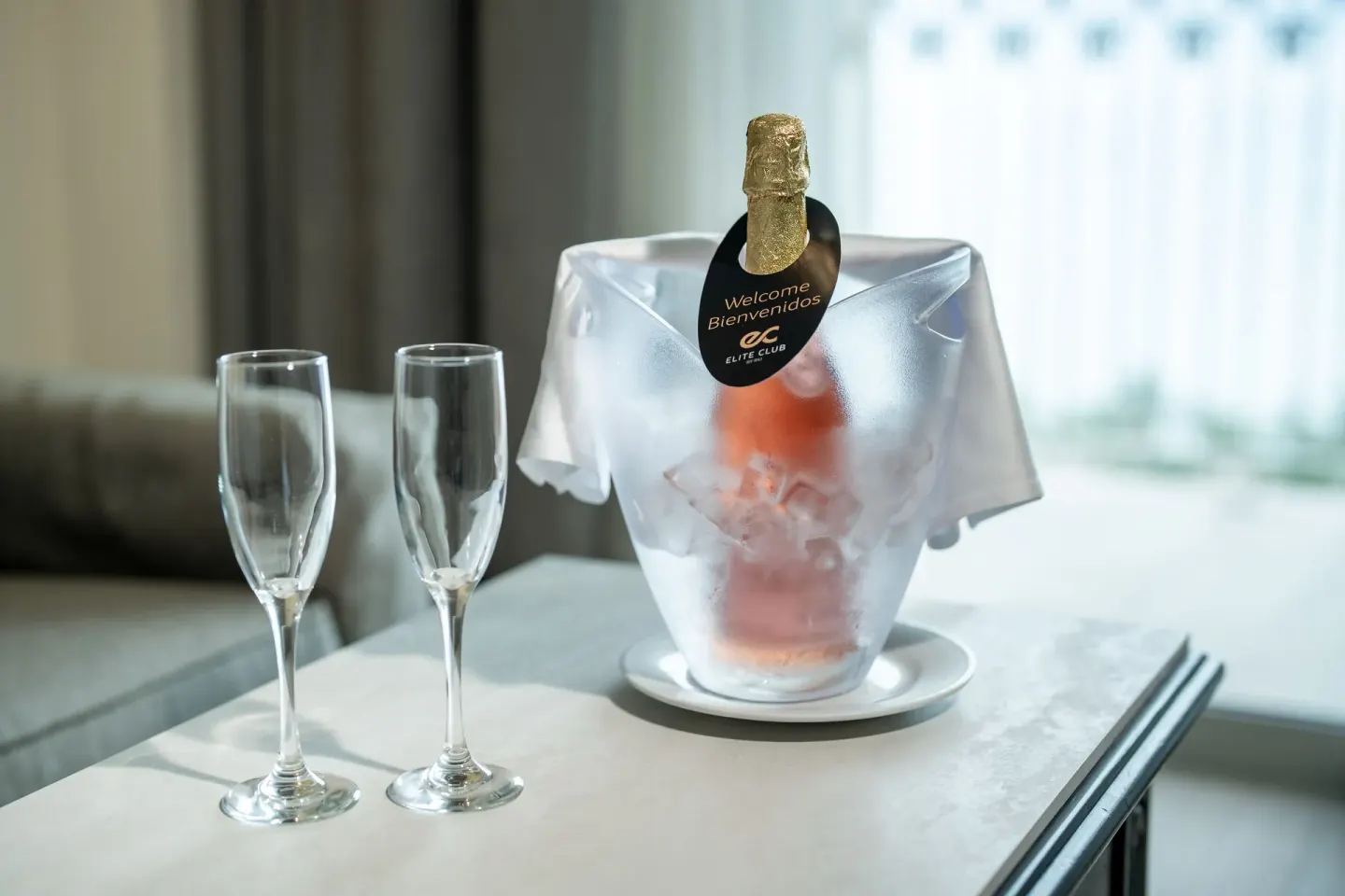 Welcome bottle on ice with two glasses in a suite at Hotel Riu Palace Pacifico.