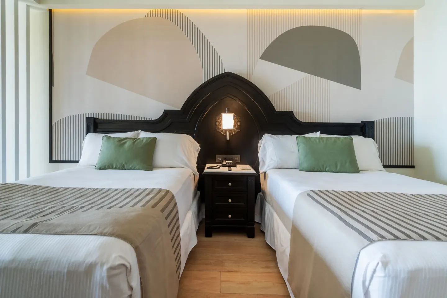 Junior Suite with two beds and shared nightstand at Hotel Riu Palace Pacifico.