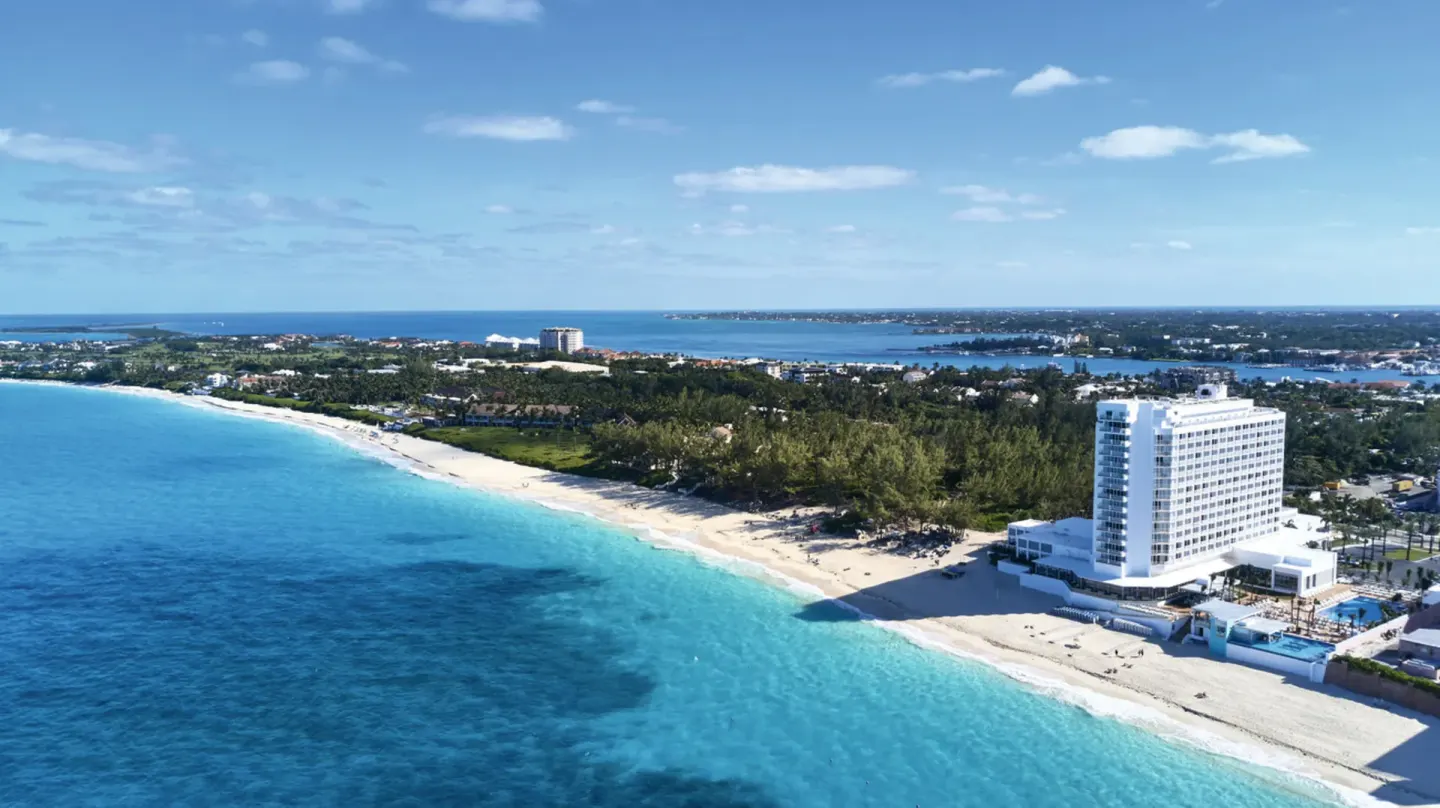 Aerial beach and resort tower view at Hotel Riu Palace Paradise Island.