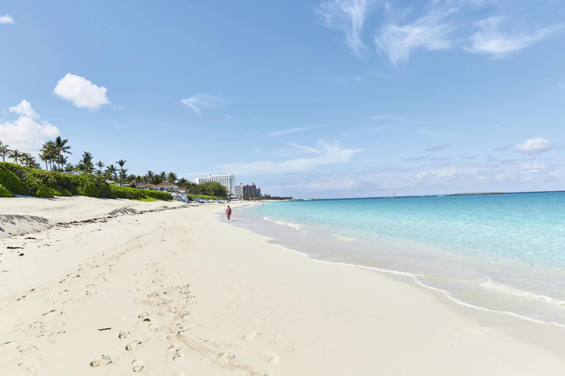 White sand beach and calm turquoise water at Hotel Riu Palace Paradise Island.