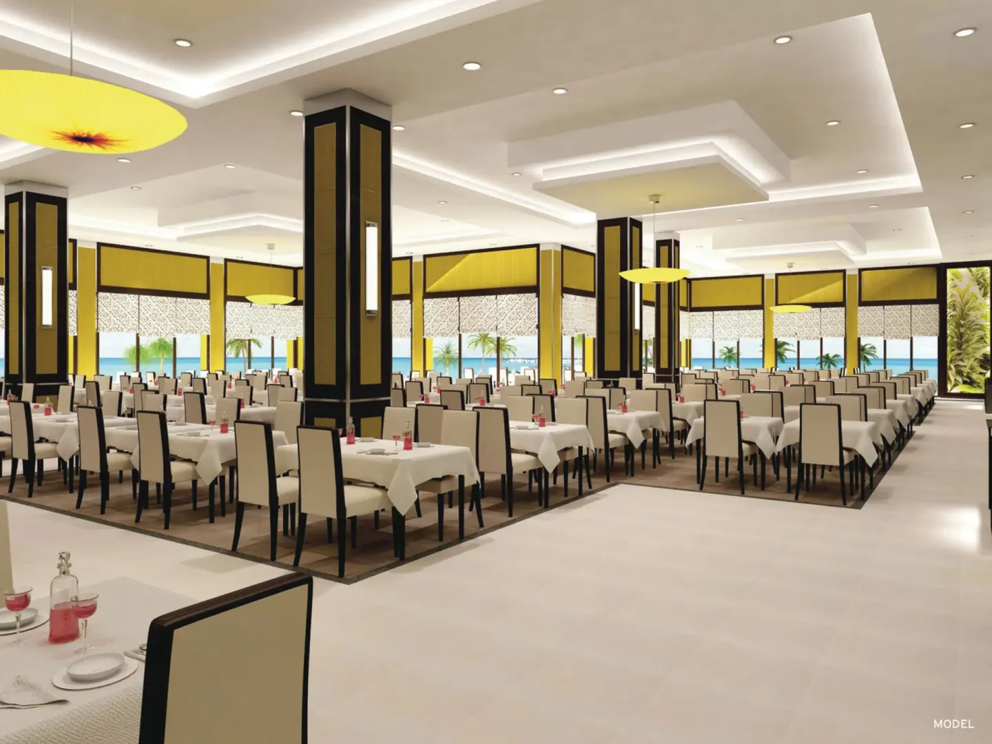 Large dining room with ocean-facing windows at Hotel Riu Palace Paradise Island.