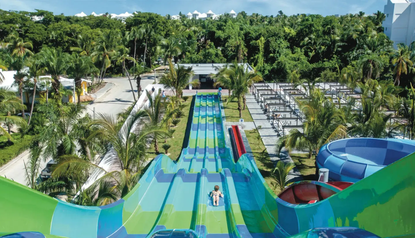 Tall multi-lane water slide and tube slides at Hotel Riu Palace Punta Cana.