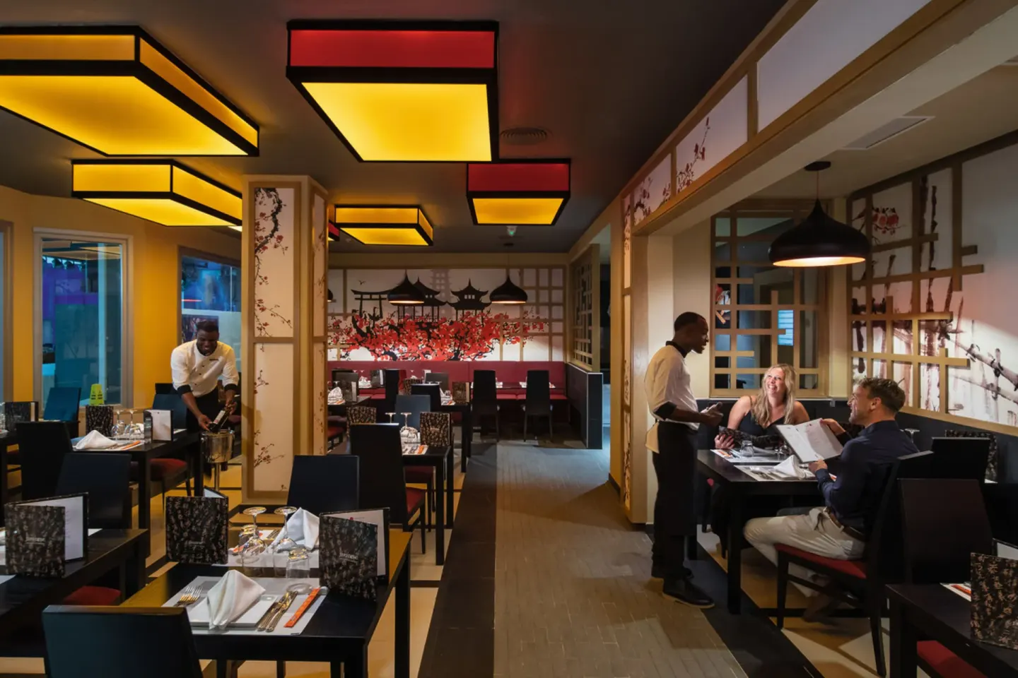 Japanese-style dining room with lantern lighting at Hotel Riu Palace Tropical Bay.