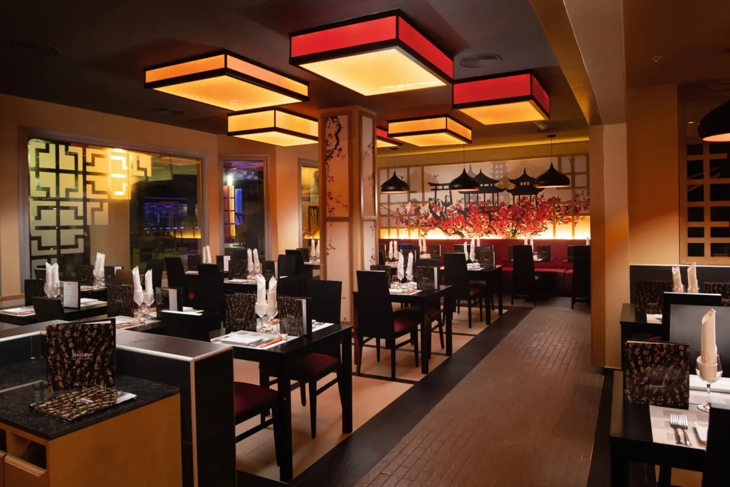 Japanese-style dining room with set tables at Hotel Riu Palace Tropical Bay.