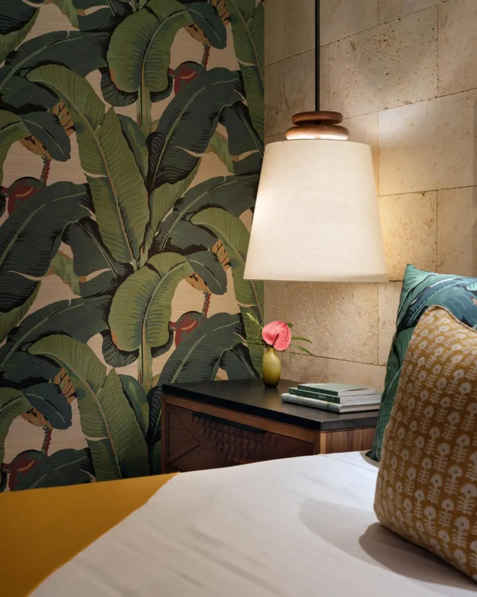 Garden View One Bedroom Suite bedside detail with leaf wallpaper at Hotel Wailea.