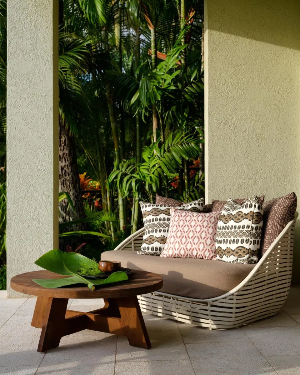 Garden View One Bedroom Suite lanai loveseat with tropical plants at Hotel Wailea.
