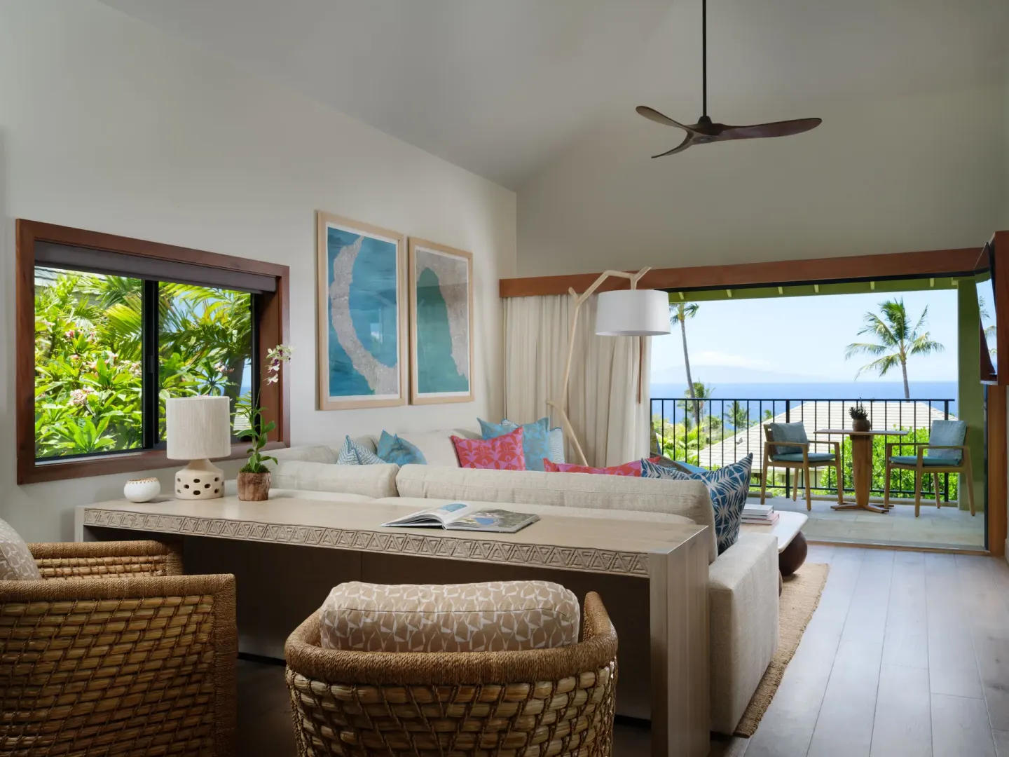 Ocean View Suite living room opening to an ocean-view lanai at Hotel Wailea.