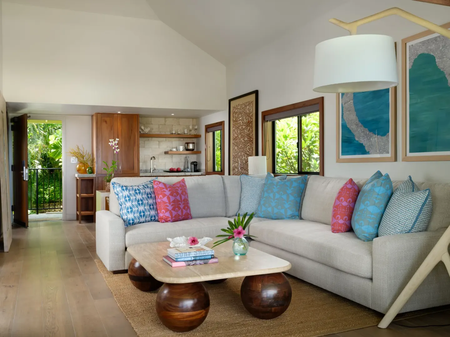 Ocean View Suite living room with sectional sofa and kitchenette at Hotel Wailea.