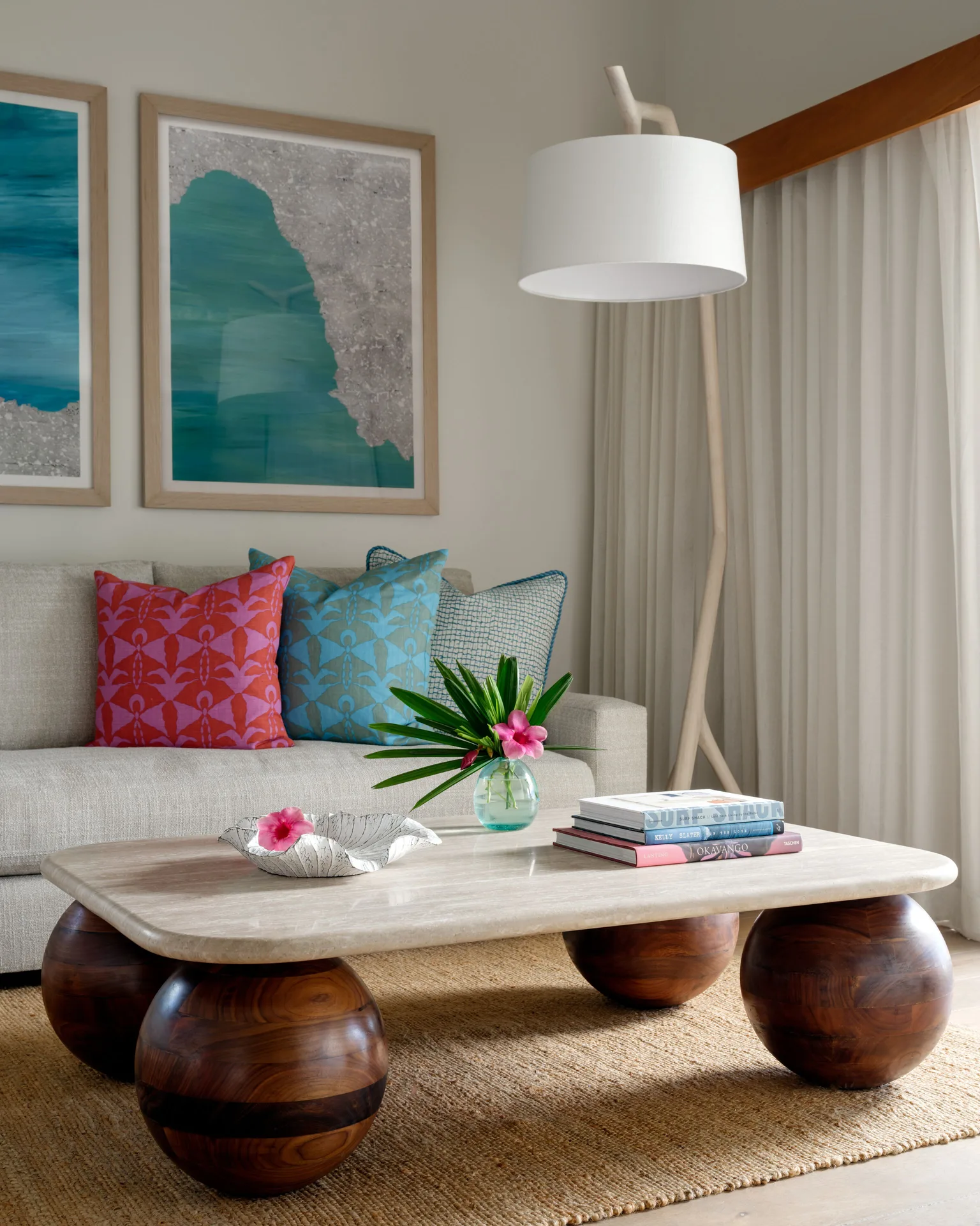 Ocean View Suite seating area with coffee table and floral accents at Hotel Wailea.