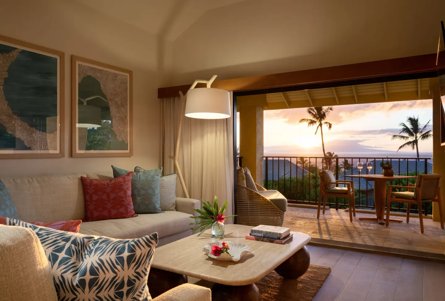 Ocean View Suite living room and sunset lanai with wine glasses at Hotel Wailea.
