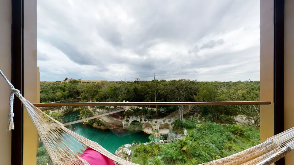 Junior Suite river spa hammock overlooking river and trees at Hotel Xcaret Arte.