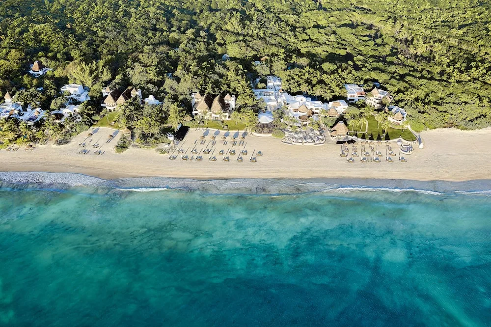 Maroma, A Belmond Hotel, Playa del Carmen luxury boutique beach resort with pristine white sand and intimate oceanfront setting.