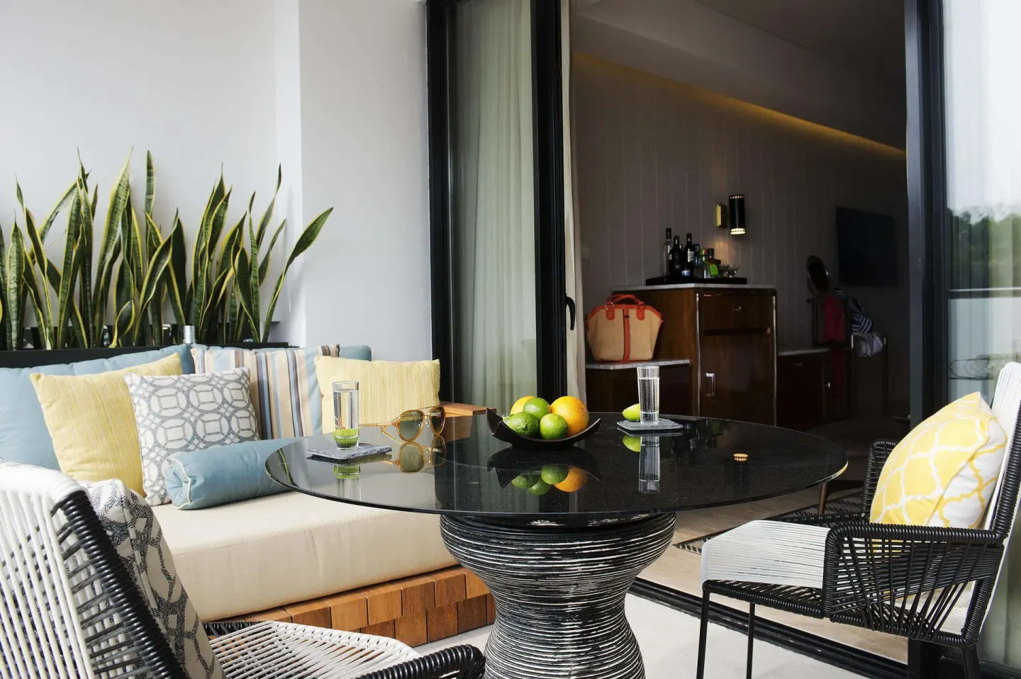 Furnished balcony with table and indoor minibar at Hyatt Centric Playa del Carmen - Downtown House & Beach House.