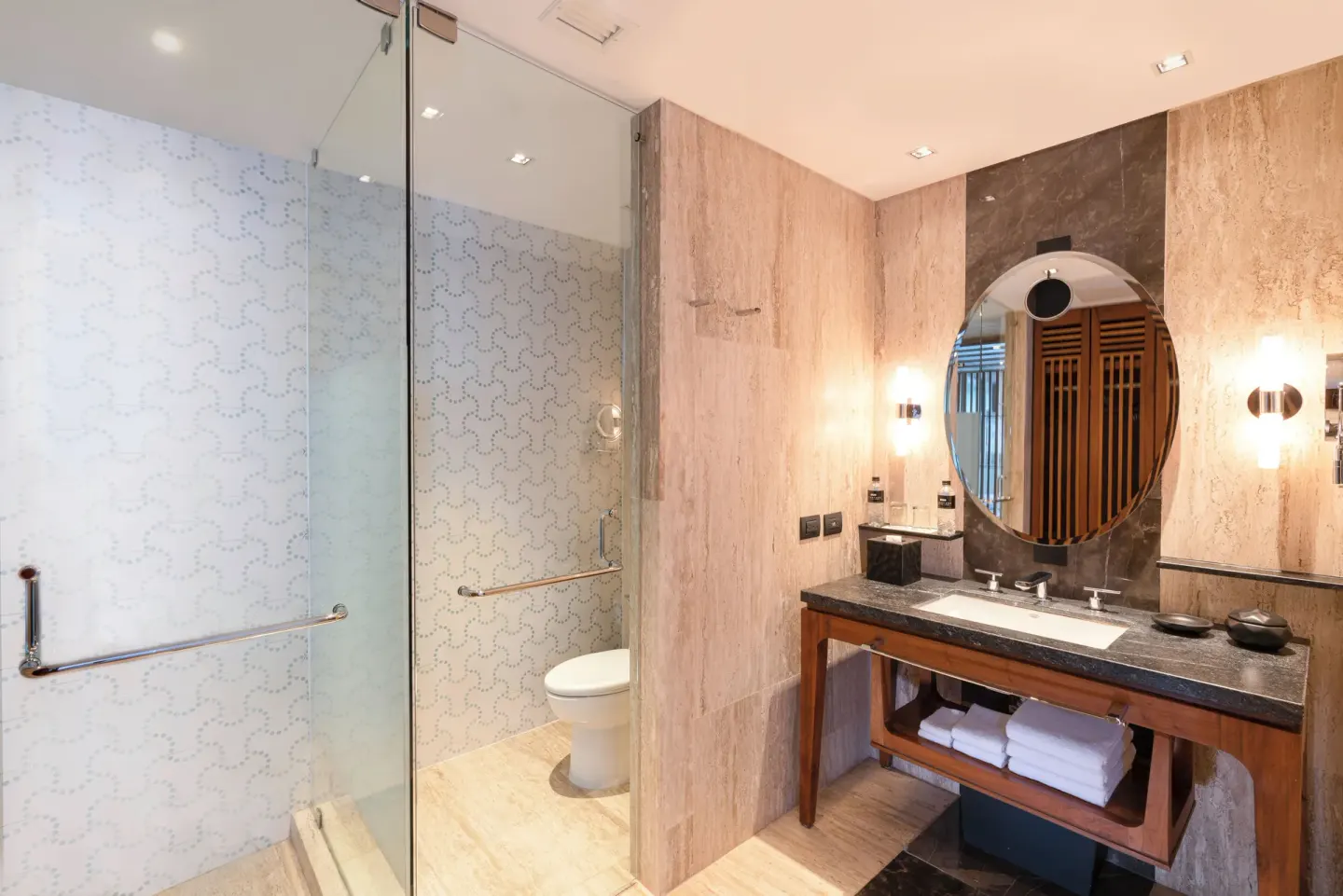 Guest bathroom with glass shower and vanity at Hyatt Centric Playa del Carmen - Downtown House & Beach House.