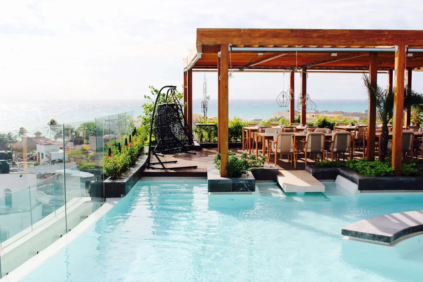 Rooftop pool and dining terrace at Hyatt Centric Playa del Carmen - Downtown House & Beach House.