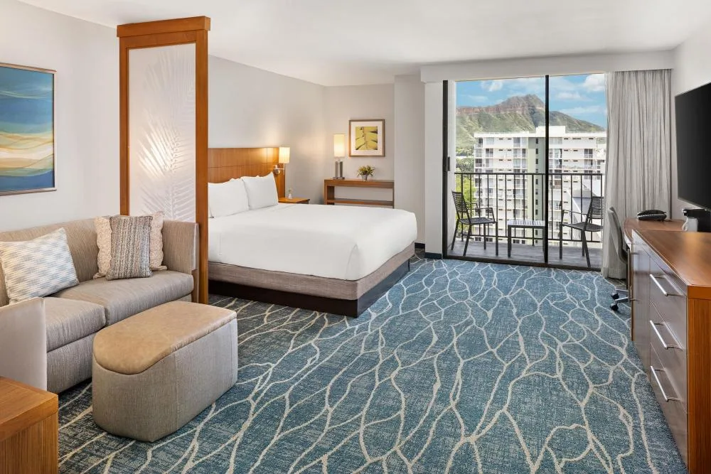 Specialty Mountain View sofa bed room with balcony at Hyatt Place Waikiki Beach.
