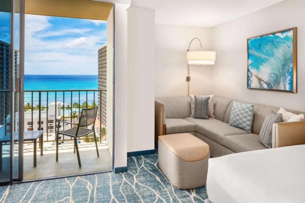 Specialty Ocean View room with sofa bed and balcony at Hyatt Place Waikiki Beach.