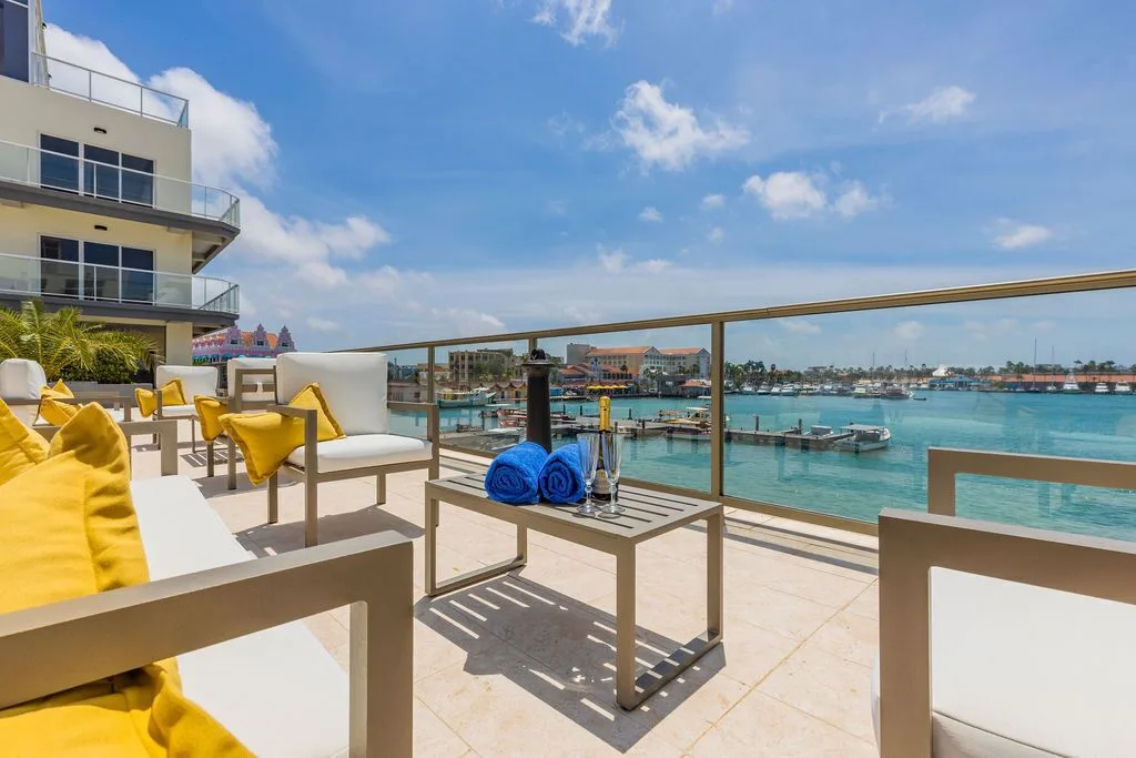 Harbour House Aruba Oranjestad waterfront property with modern residences and marina views