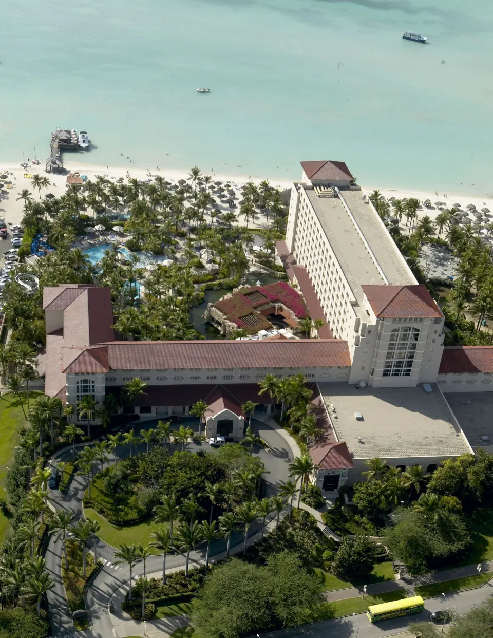 Aerial view of the beachfront resort and pools at Hyatt Regency Aruba Resort and Casino.