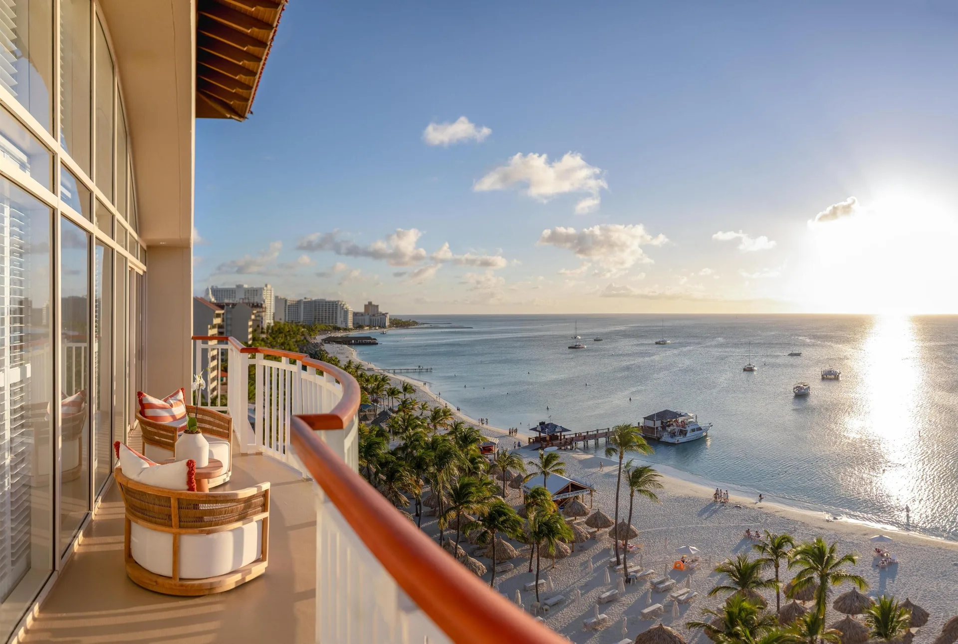 Balcony seating overlooking the beach at Hyatt Regency Aruba Resort and Casino.