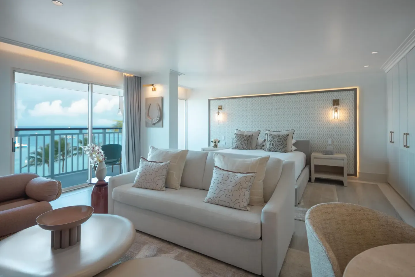 Ocean-view suite with king bed and sofa at Hyatt Regency Aruba Resort and Casino.