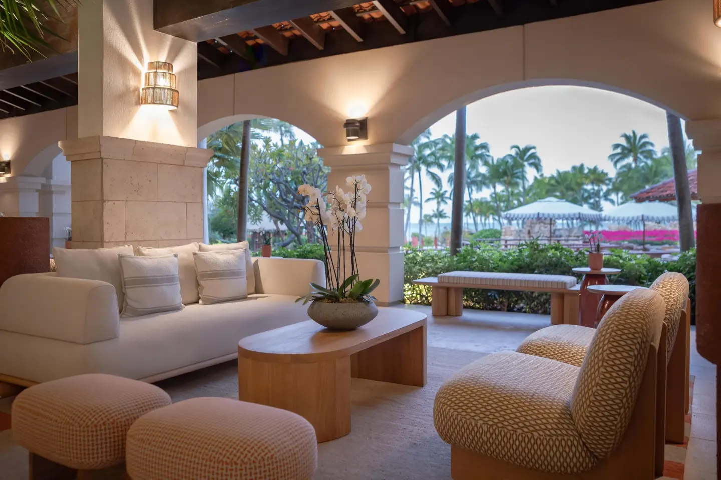 Covered lobby lounge with arched openings at Hyatt Regency Aruba Resort and Casino.