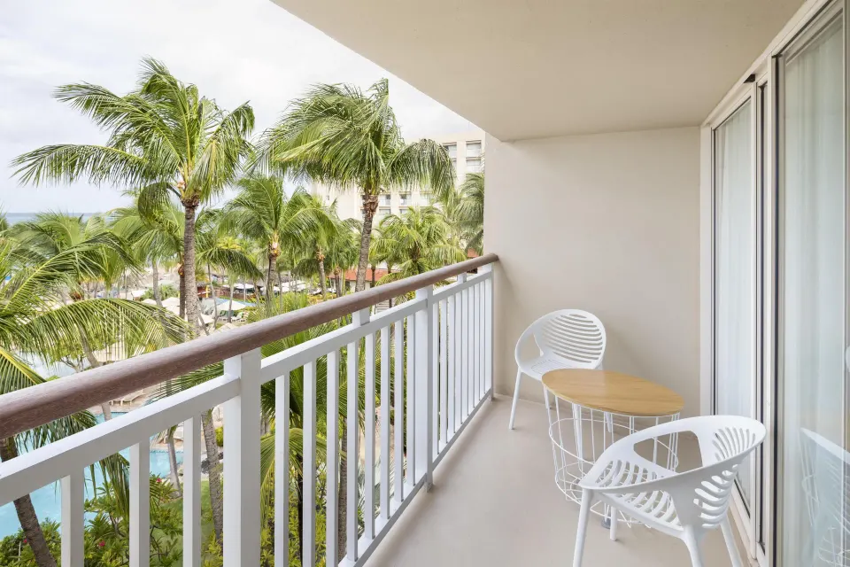 Furnished resort-view balcony at Hyatt Regency Aruba Resort and Casino.