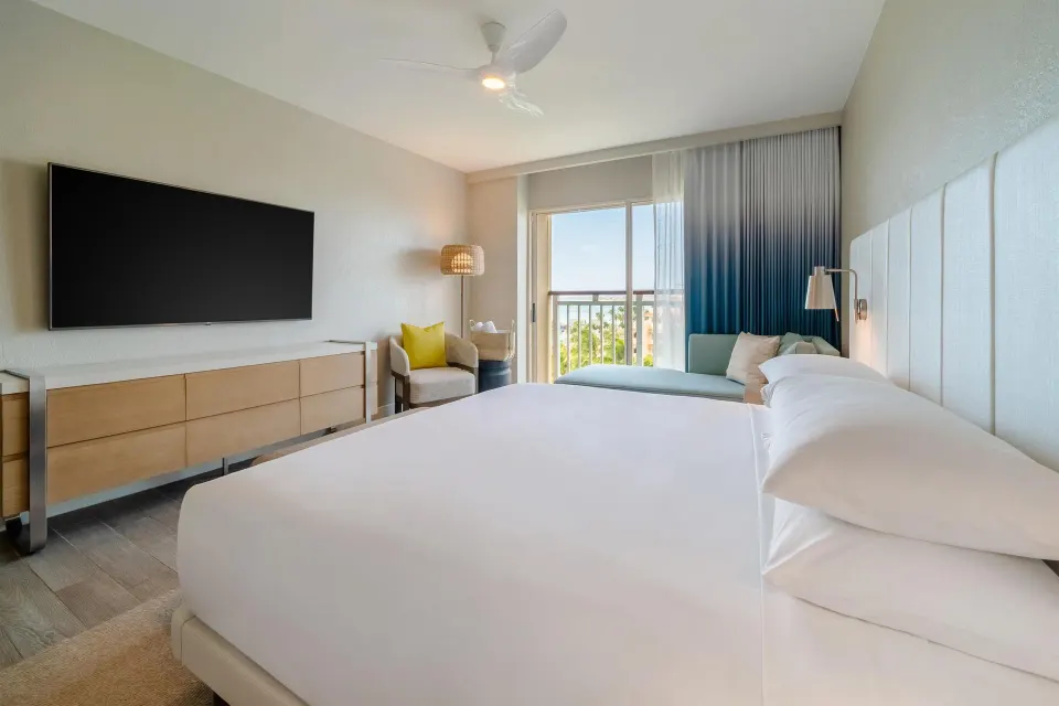 King guest room with balcony ocean view at Hyatt Regency Aruba Resort and Casino.