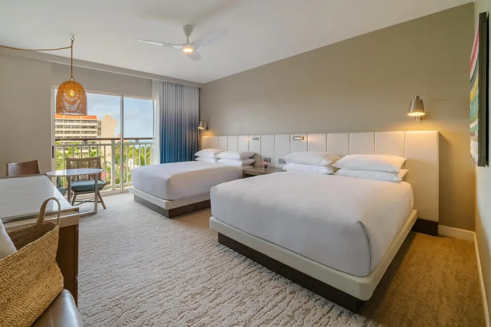 Two-bed resort view room with balcony at Hyatt Regency Aruba Resort and Casino.
