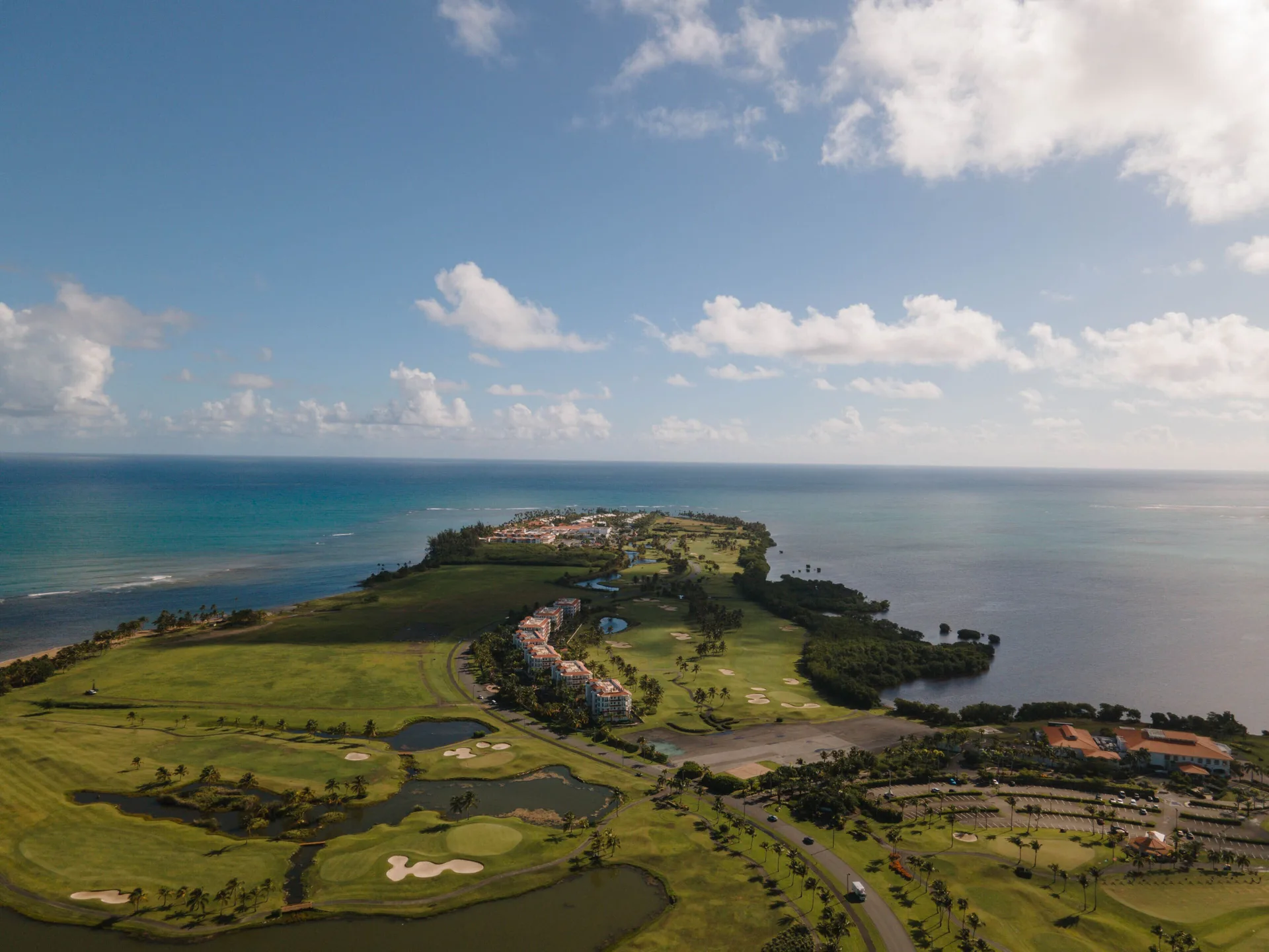 Aerial oceanfront resort and golf course view at Hyatt Regency Grand Reserve Puerto Rico.