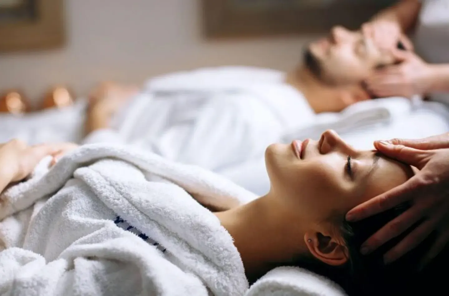Guests receive spa head massages in robes at Hyatt Regency Grand Reserve Puerto Rico.