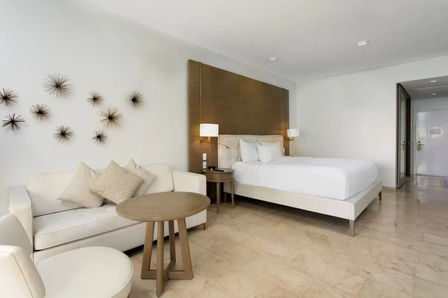 Deluxe Garden View king room with sofa seating at Hyatt Regency Grand Reserve Puerto Rico.