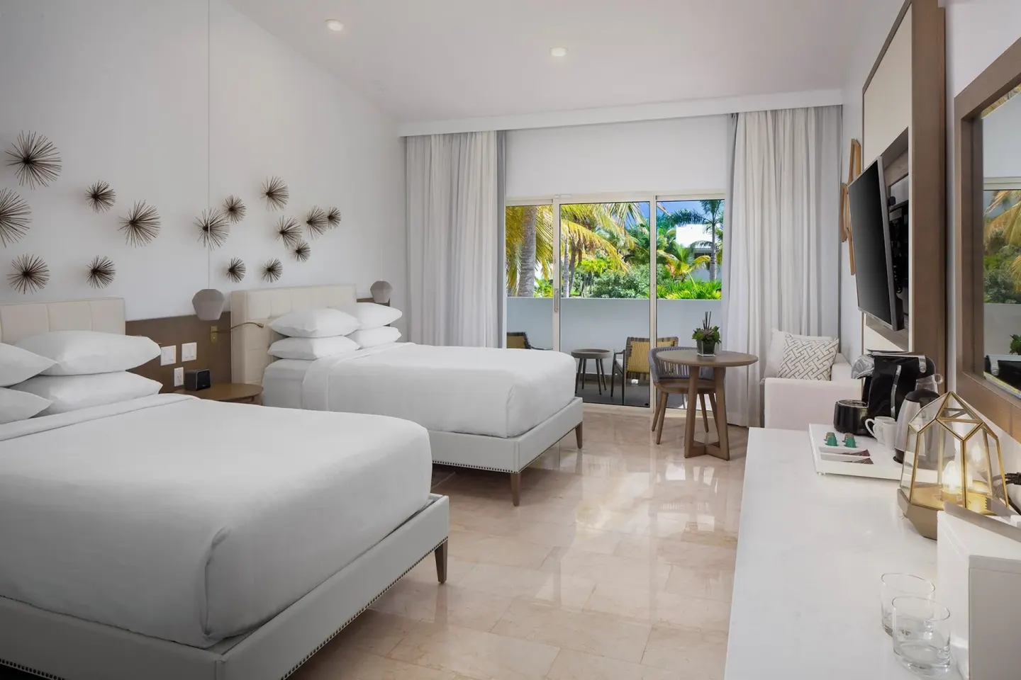 Deluxe Garden View room with two beds and balcony at Hyatt Regency Grand Reserve Puerto Rico.
