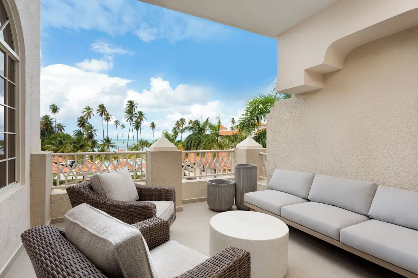 Deluxe Villa ocean-view terrace with lounge seating at Hyatt Regency Grand Reserve Puerto Rico.