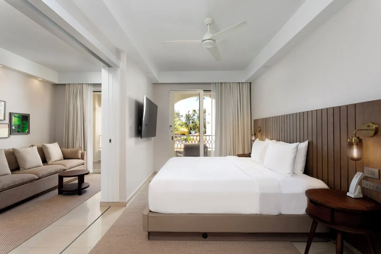 Deluxe Villa king bed and sitting area at Hyatt Regency Grand Reserve Puerto Rico.