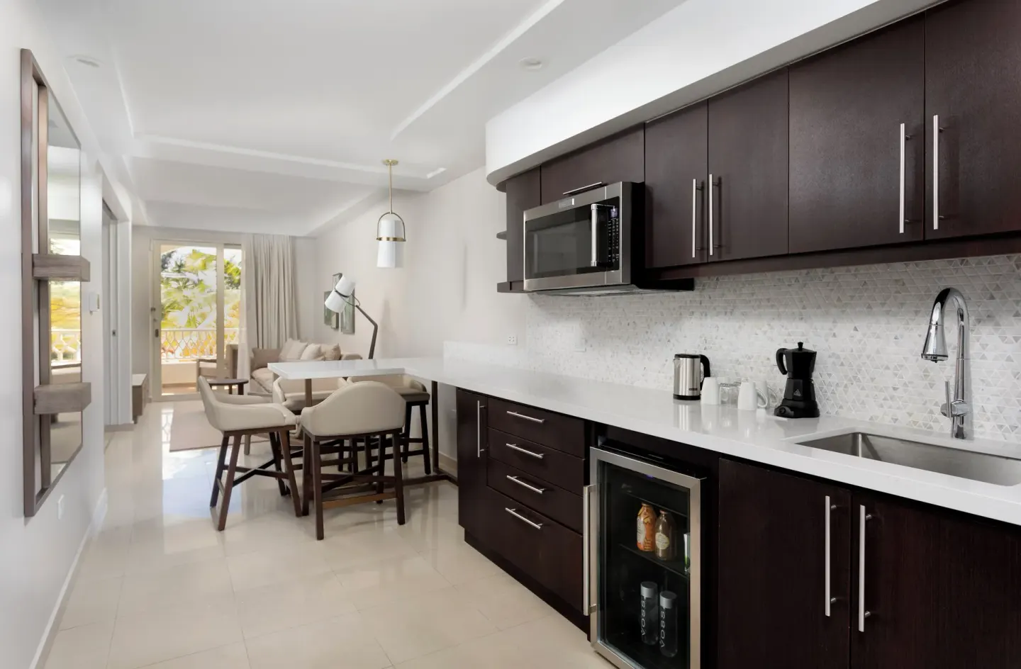 Deluxe Villa kitchenette with dining counter at Hyatt Regency Grand Reserve Puerto Rico.